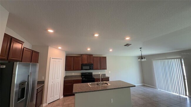Building Photo - 7419 Rosy Periwinkle Ct