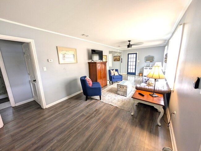 Bright and cozy living room with smart TV - 4107 Crane St