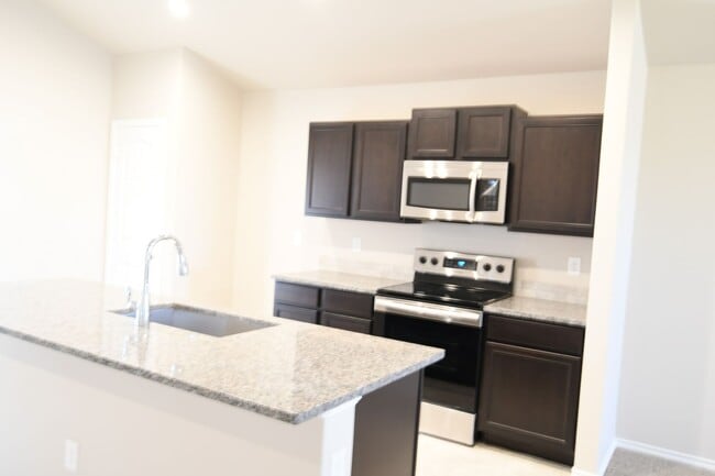 Building Photo - Beautiful Brand New Custom Brick Home 3 bed/ 2 bath/ 2 car garage Open Concept with huge backyard...