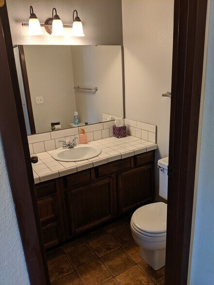 Downstairs restroom. - 2115 Pleasanton St