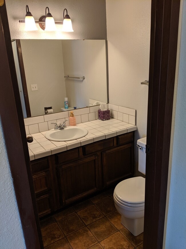 Downstairs restroom. - 2115 Pleasanton St
