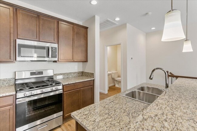 Building Photo - The Tahoe - Luxury 3 Bedroom, 2.5 Bath Townhome with Full 2 Car Garage