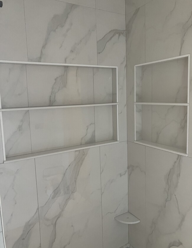 SPA SHOWER FOR TALL SHAMPOO AND CONDITIONER BOTTLES (SPACE FOR EVERYONE!) - 29 E Northwood Ave