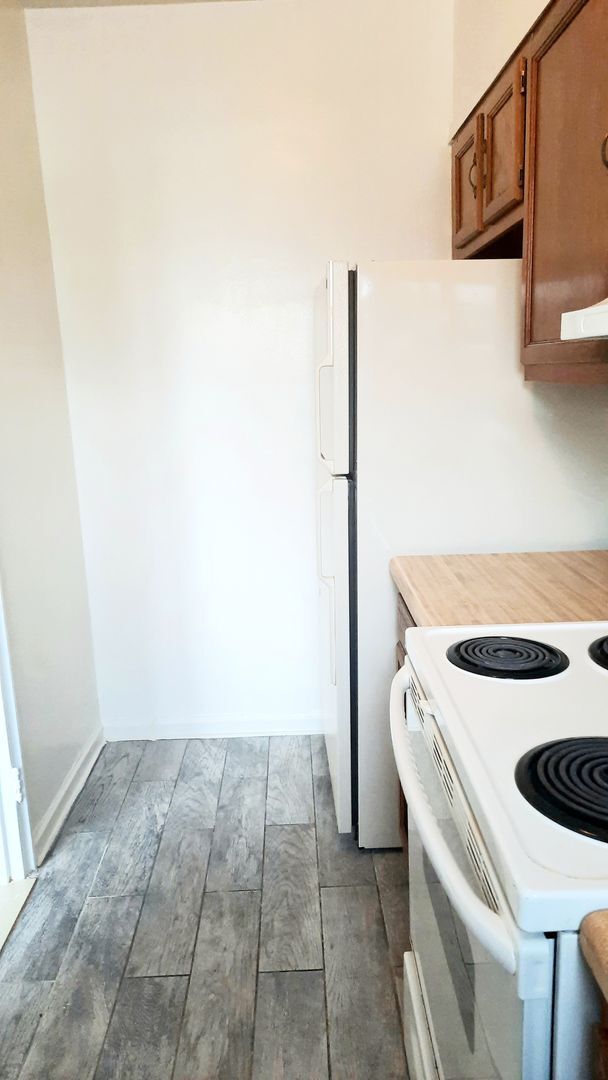Building Photo - NOW LEASING AT BUNKER HILL FLATS!