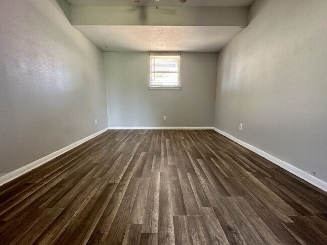 Building Photo - Updated Home with Gorgeous Floors & Large ...