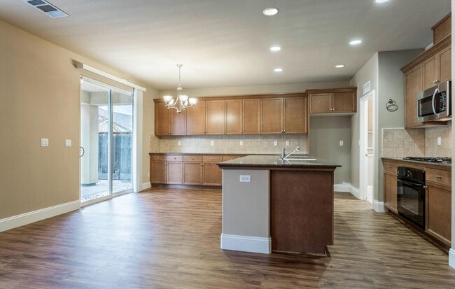 Building Photo - Great Harlan Ranch Home! Don't miss out! It won't last long!