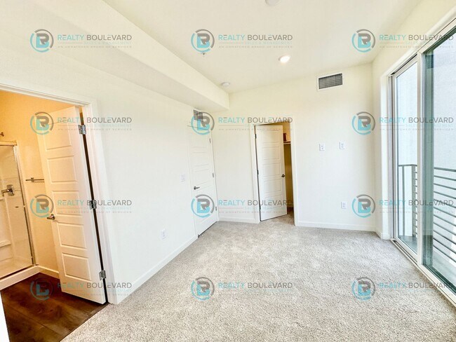 Building Photo - Modern 2 Bedroom 2Bath  Townhome with Dual Patios & Designer Finishes near Truckee River