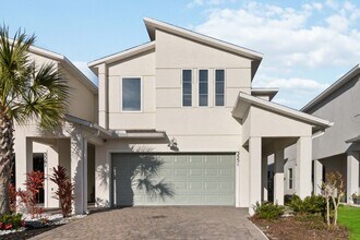 Building Photo - Like New 4/3 Townhome in Gated Community W/ Community Pool