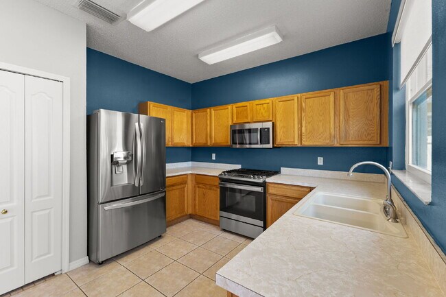 Building Photo - "Spacious 4-Bedroom Gem with 2.5 Baths in ...