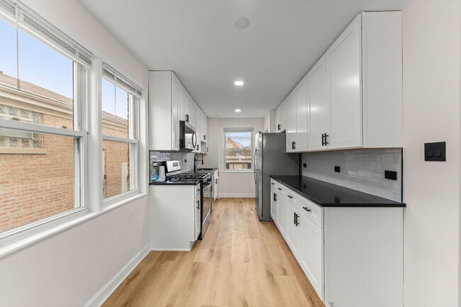 Building Photo - 5251 S Hamlin Ave