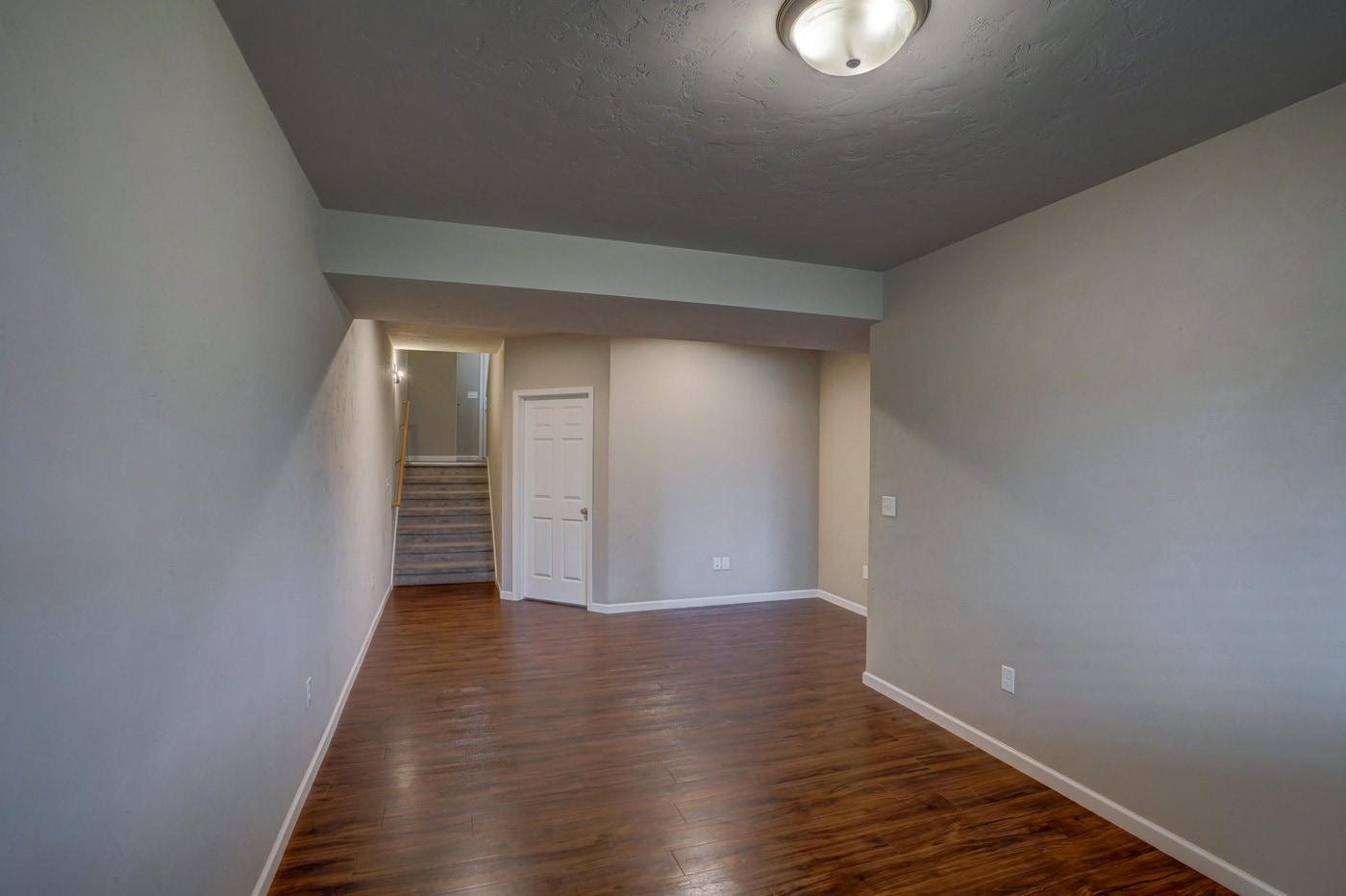 Lower level living area looking up to foyer - 826 Thompson Dr