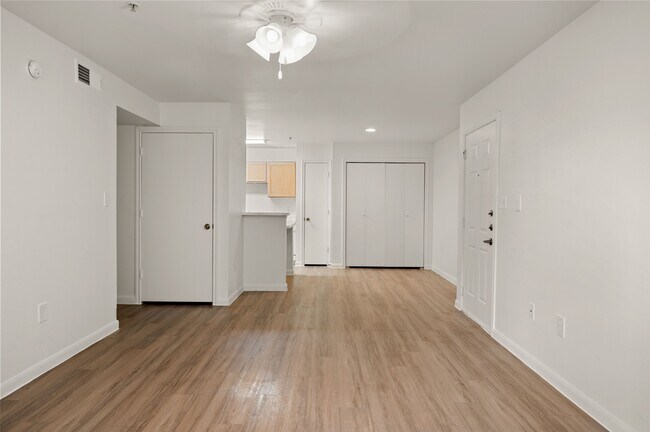 Entry, Living Room & Dining Room - C1 Floorplan - Memorial Heights at Washington