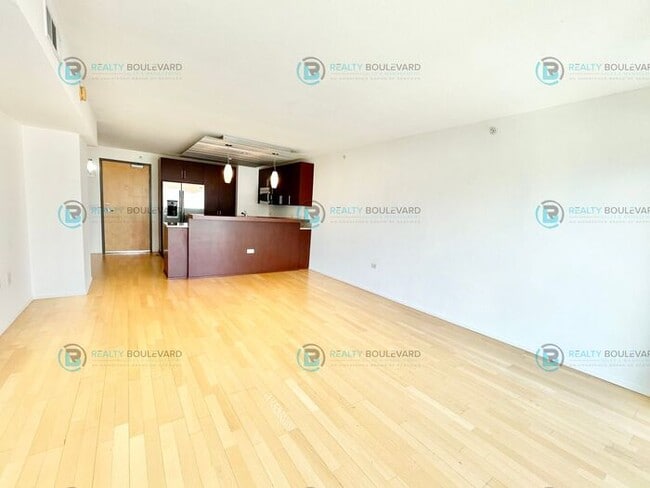 Building Photo - Modern 1 Bedroom 1 Bath Luxury Condo at Th...