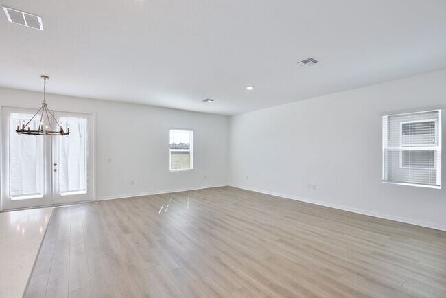 Building Photo - Stylish Sunbrooke Sanctuary! Modern 4/2 Ho...