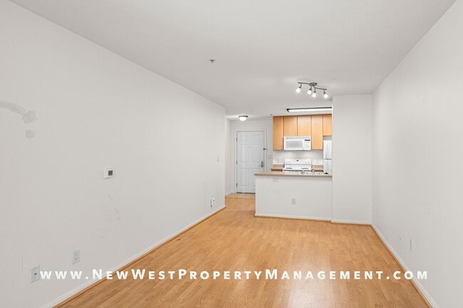 Building Photo - Charming Little Italy 1-Bedroom at Portico! Small Pet OK! Available Now!