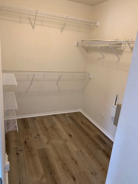 Master walk-in closet - 10219 Roseangel Ln