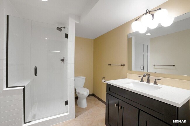 Building Photo - Spacious 4BR Condo in Evergreen