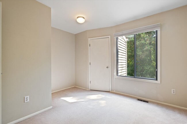 Bedroom 3 with entry to laundry room - 4745 Cedar Lake Rd S