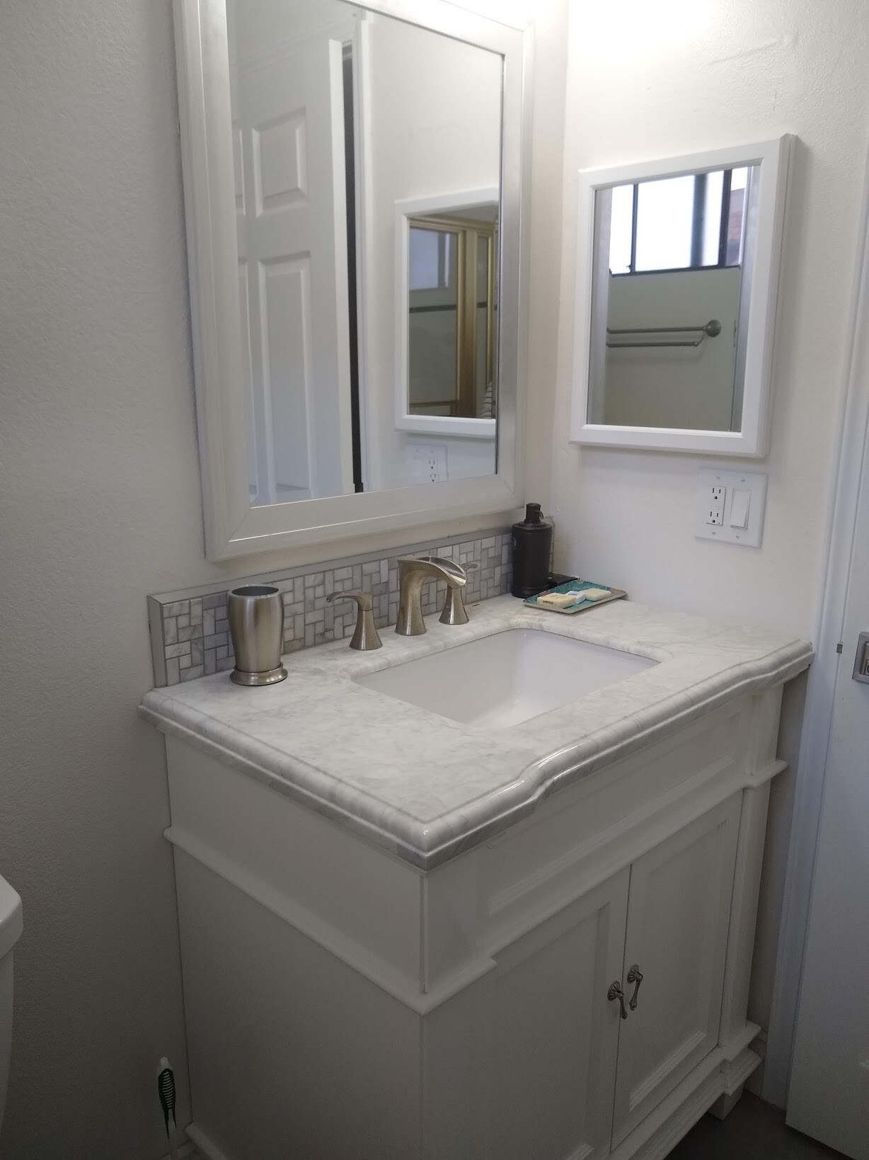 guest vanity with marble countertop - 14572 Dickens St