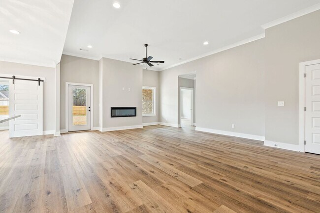 Building Photo - Available now! New Spacious 3 br 2.5 Ba with private 2 car garage, covered patio and fenced in ba...