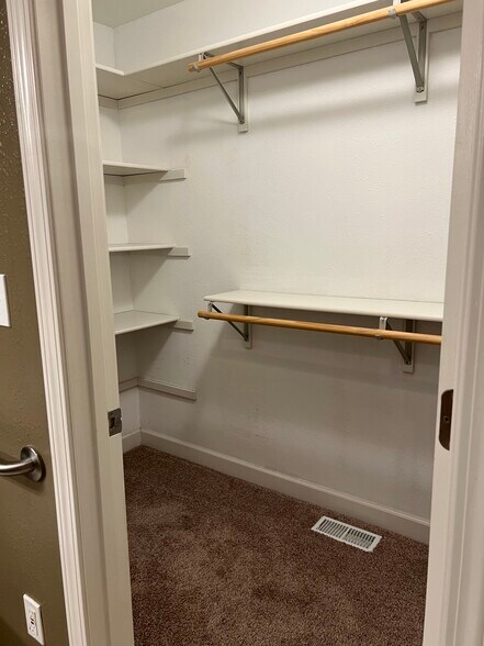 Master bedroom closet (upstairs) - 4701 Rainbow Trout Dr