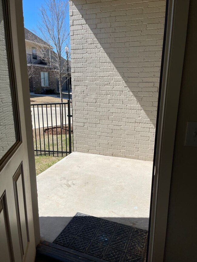 Building Photo - *Fully Furnished* 4 bedroom, 2.5 bathroom, 2 car garage Gated Neighborhood