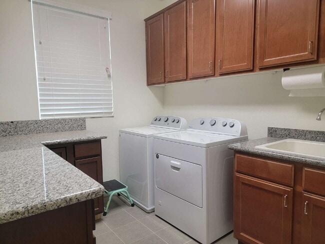 Building Photo - 4 bedroom home with a fully self  contained casita with a 3 car garage