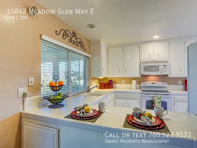 Building Photo - 10842 Meadow Glen Way E