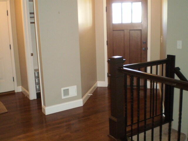 front door and stairs to basement - 99 Tuscany Cir