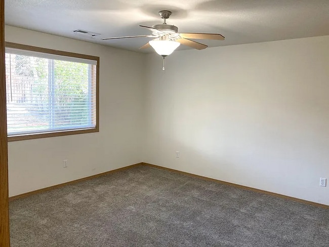 Building Photo - this ranch-style home features 4 bedrooms and 2 bathrooms.