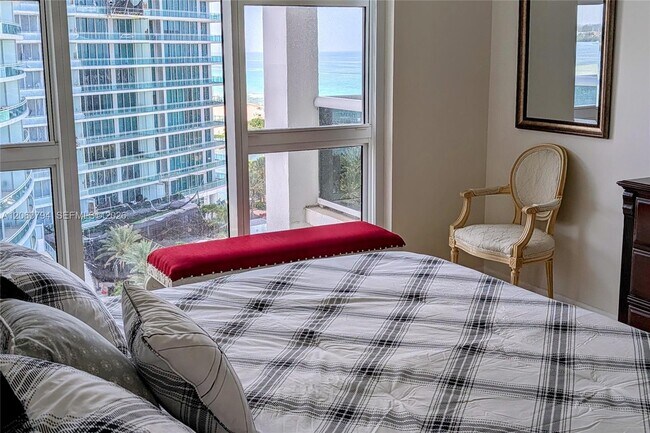 Building Photo - 10275 Collins Ave