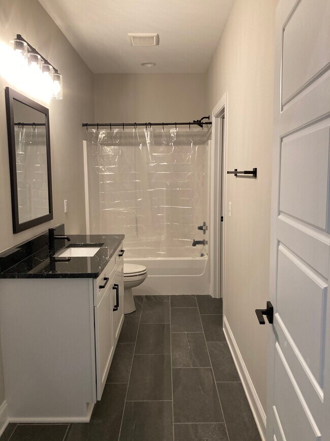 Bathroom with walk in closet - 4912 Florida Ave