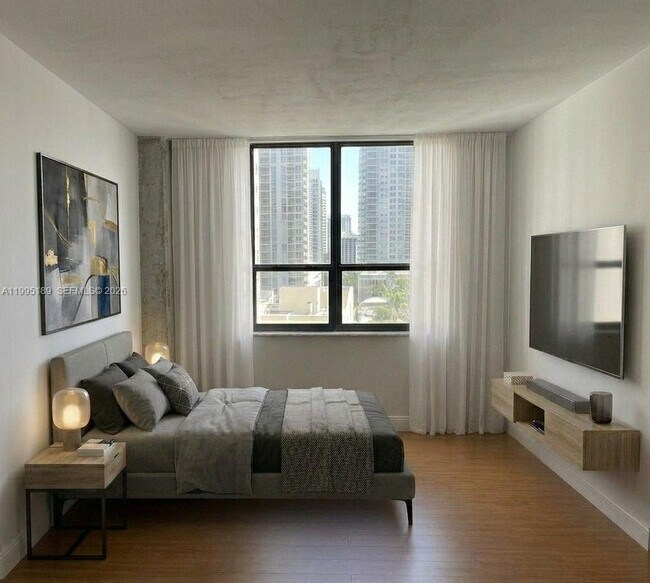 Building Photo - 10185 Collins Ave