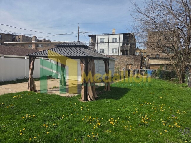 Building Photo - Spacious 4-Bedroom Home with Finished Basement and Yard Space