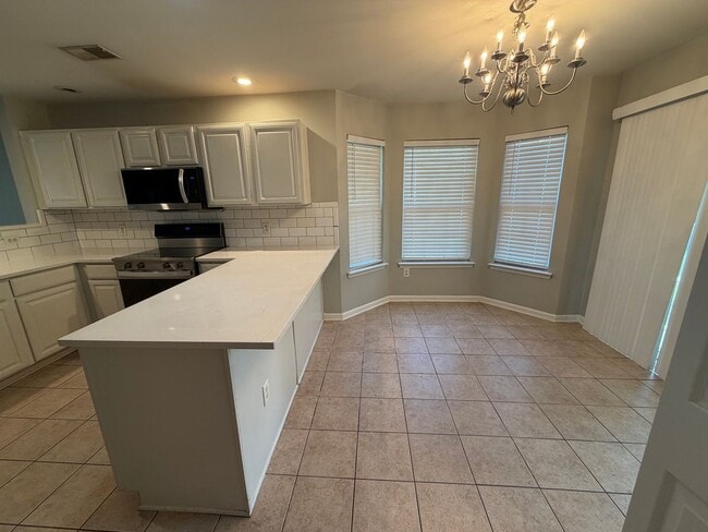 Building Photo - Cute, Convenient Townhome!