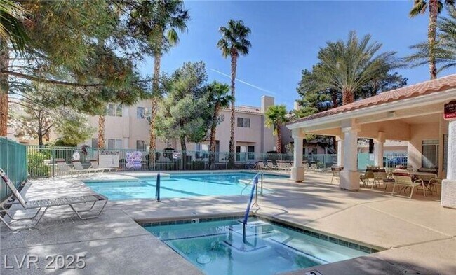 Building Photo - GORGEOUS 2nd FLOOR UNIT IN DESIRABLE GATED...