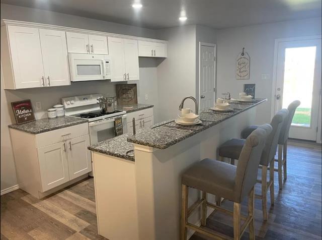 Building Photo - 8424 10th Pl