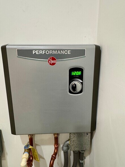 Energy efficient instant hot water system - 136 E King St