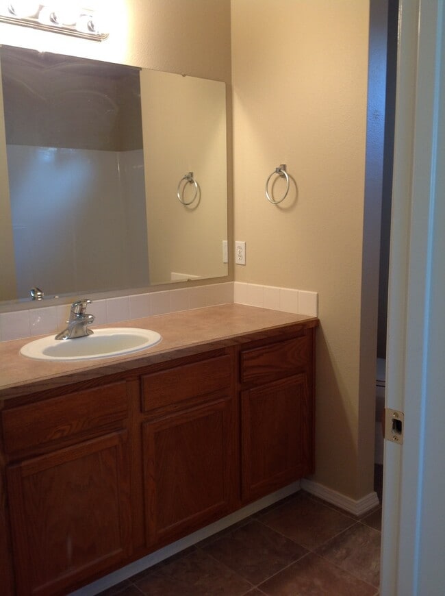 Building Photo - Fabulous location. Nice home with new carpet and paint. Living and family room.
