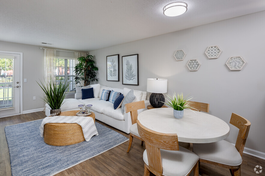 Dining room and living room from kitchen. - Seaside Grove Apartments