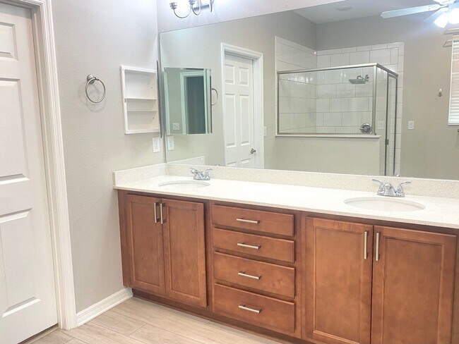 Building Photo - Three Bedroom Home In Gated 55+ Exclusive Community