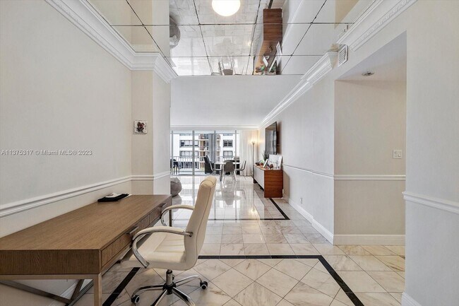 Building Photo - 10155 Collins Ave
