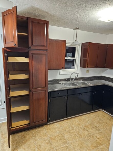 Pantry has slideout drawers - 404 Rams Rd