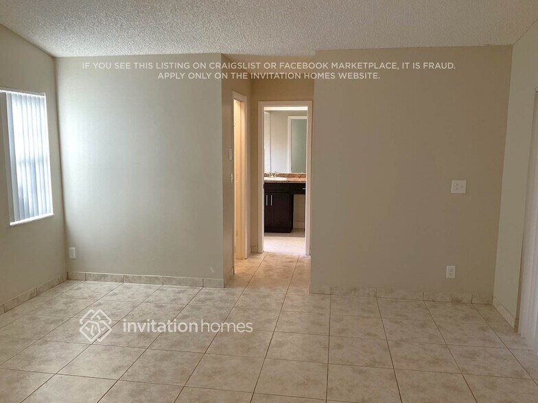 Building Photo - 8825 NW 57th Ct