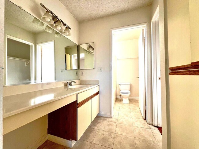 Building Photo - 2-Bedroom, 2-Bath Upstairs Condo Unit in Gated Pomona Community, Water/Trash/HOA Included!