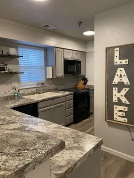 Building Photo - Fully furnished water front condos - BOAT SLIP INCLUDED