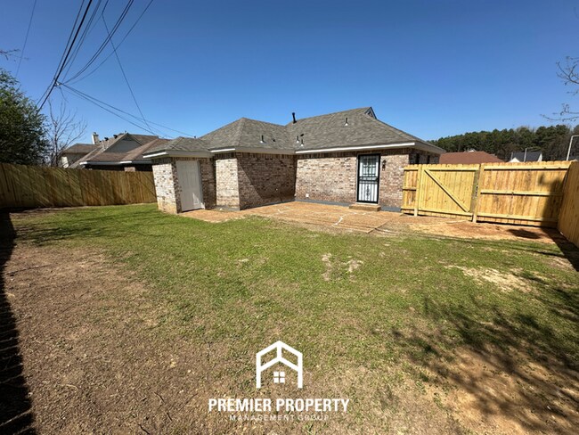 Building Photo - Spacious 4BR/2BA Home in 38141 | Vinyl Flooring & Large Fenced Backyard