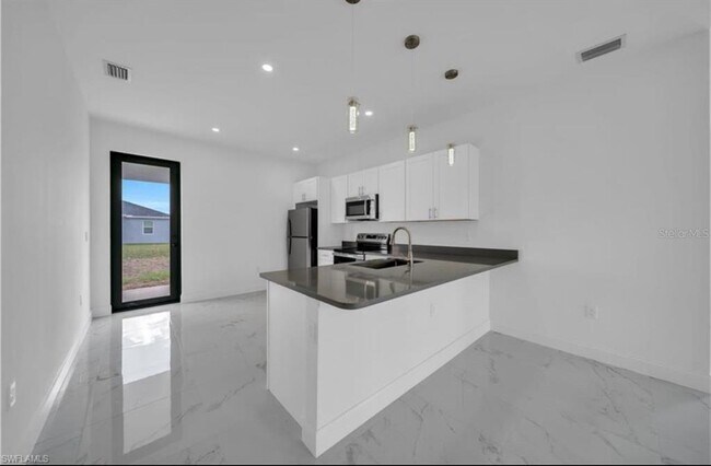 Building Photo - 4646 Leonard Blvd S