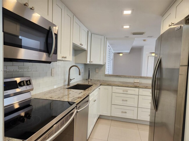 Building Photo - 5201 Orduna Dr