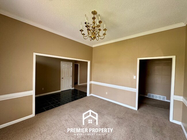 Building Photo - Spacious 3BR/2BA Near Southwind | 1,958 Sq Ft, Brick Fireplace, 2-Car Garage & Quiet Cove